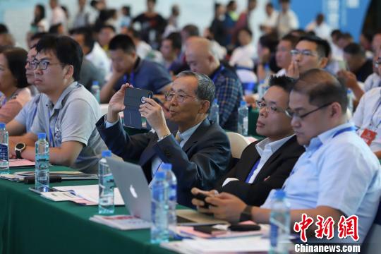 研討會現(xiàn)場圖?！■暮陚?攝